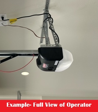 Garage door operator installed on ceiling